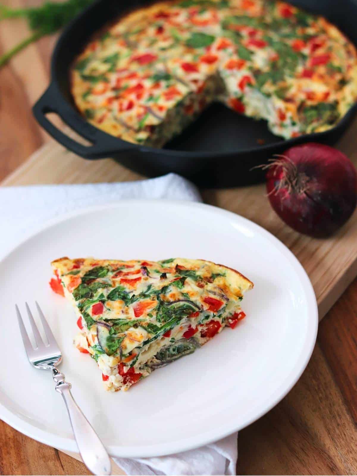 eating a slice of frittata.