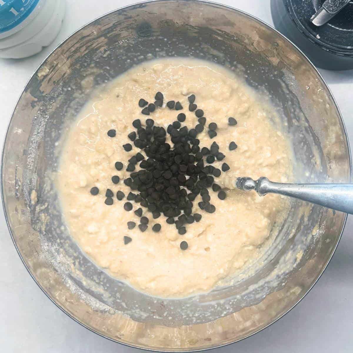 Folding chocolate chips into the protein pancake batter